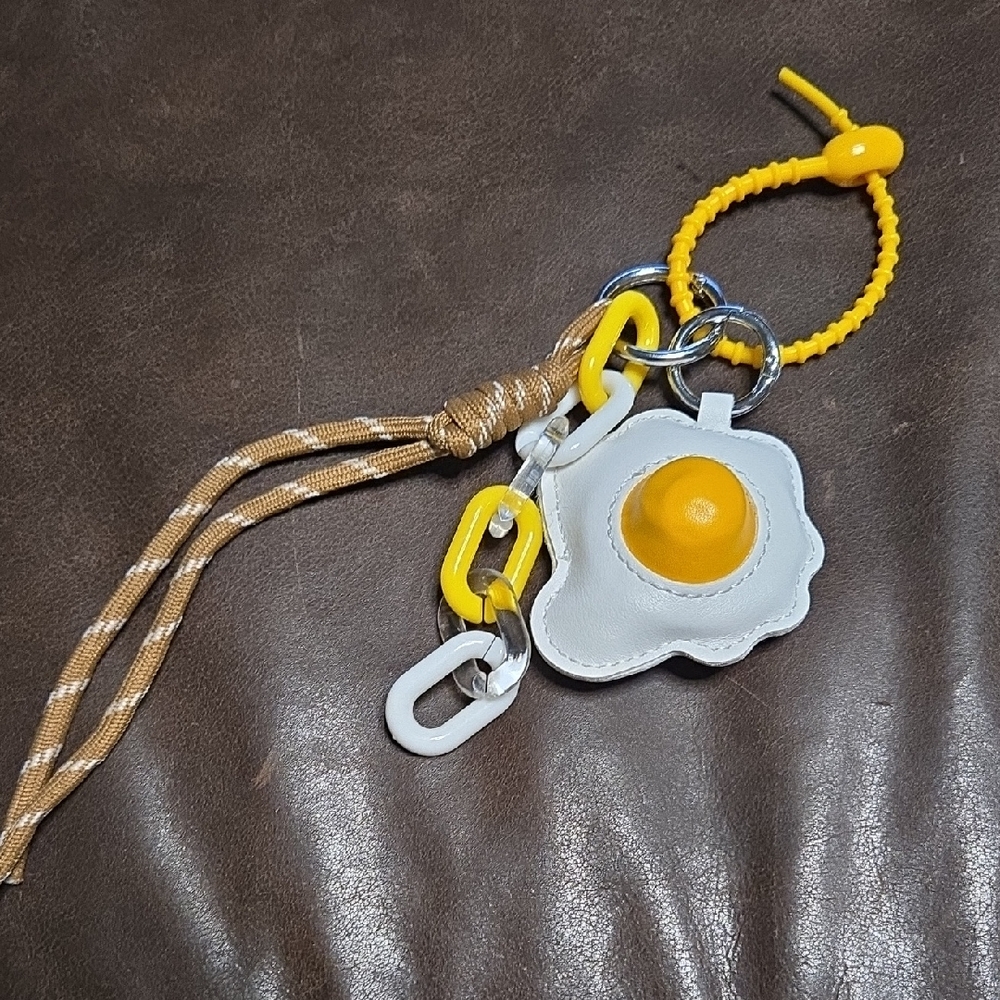 Egg Keychain with Yellow and White Accents